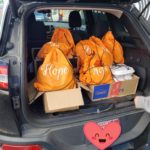 Trunk full of warm meals and kindness kits